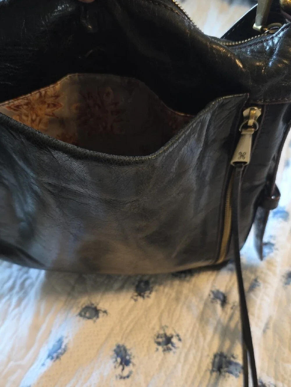 HOBO Black Leather Crossbody with Zip Accent and Decorative Adjustable Strap